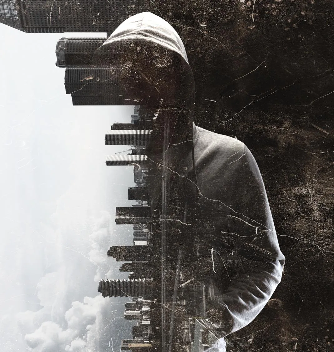 A hooded figure superimposed over a city skyline